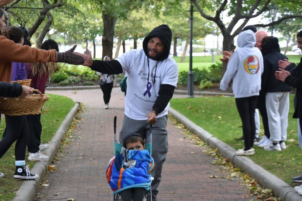A father and son walking for the cause.