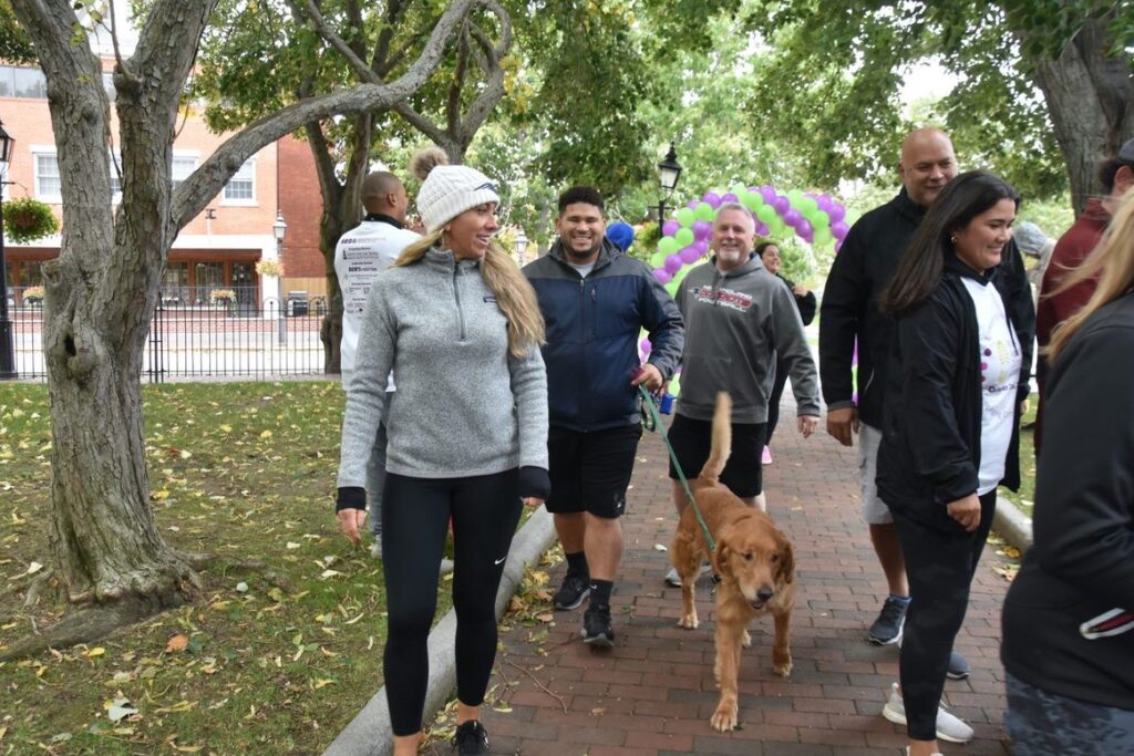 Participants walking with their dog.