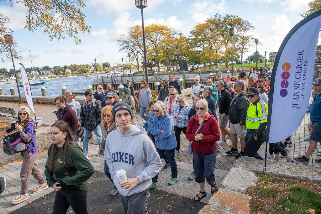 Walk Against Domestic Violence Finish Line with Walkers at 2024 event